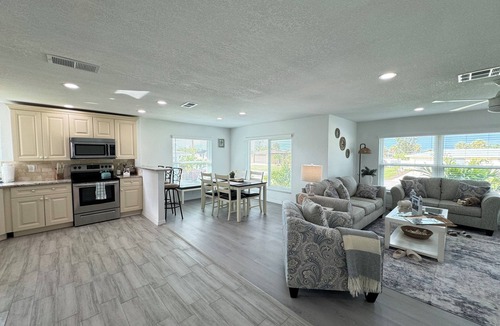Oakland Hills House | Waterfront Retreat 4 BR, 3 BA screened & heated pool, gorgeous canal views