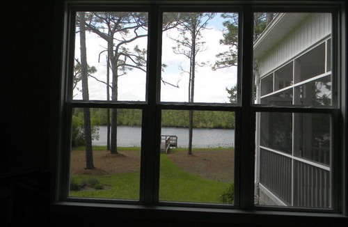 Boiling Spring Lakes House | Waterfront Lake with dock and lake access for your kayak at the park.