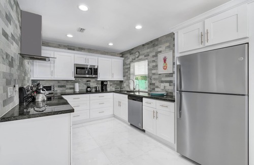 Royal Poinciana Villa | Your house with 4 bedroom 3 full bathrooms 6 min to the beach