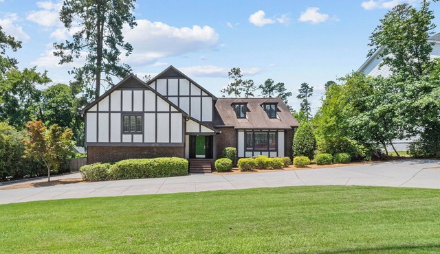 4,000 sf home offers 6 bedrooms, 3 full baths, and 3 separate living rooms,