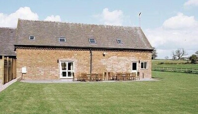 A spacious four star barn conversion set in 150 acres of farmland.