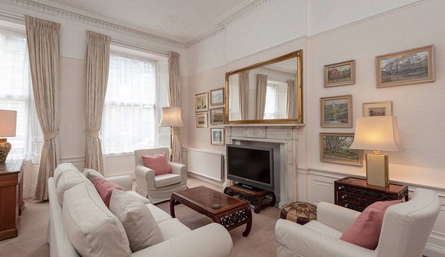 An elegant two-bedroom apartment in the heart of the city. Sleeps 4.
