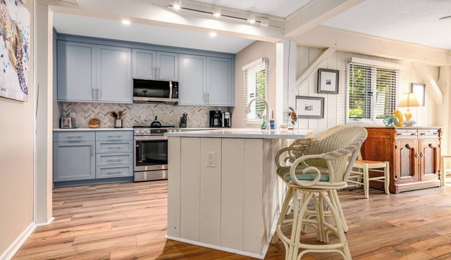 Beautiful sunsets at this marsh view condo; enjoy the community pool close to all islands amenities