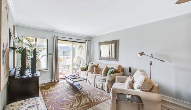 Comfortable villa one row away from the beach w/shared pool & grills