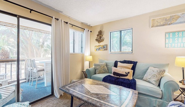 Condo by the beach with heated pools, hot tub, patio, tennis, central AC, & W/D