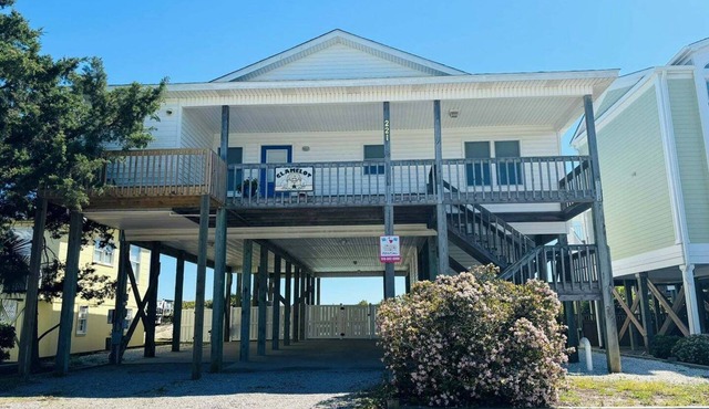 Discover Clamelot in Holden Beach: a 4-bedroom oceanfront haven for up to 8 guests!