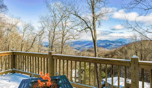 Elevated mountain-view cabin with private hot tub, 2 decks, firepit, & grill