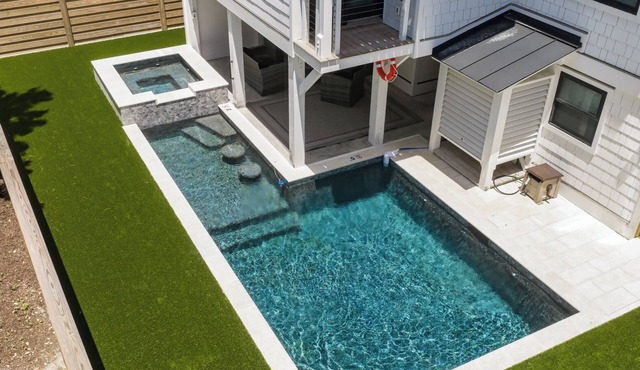 Experience Ocean and Pier Views at this Modern Luxury Beach House.