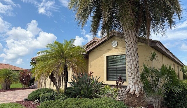 Gated Tuscan Paradise: 4BR/3BA Home + Lagoon Pool, Tennis & Fitness Club Access