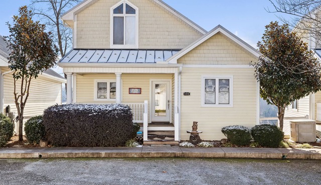 Lakeview home with pool, balconies, washer/dryer, fireplace, & cable