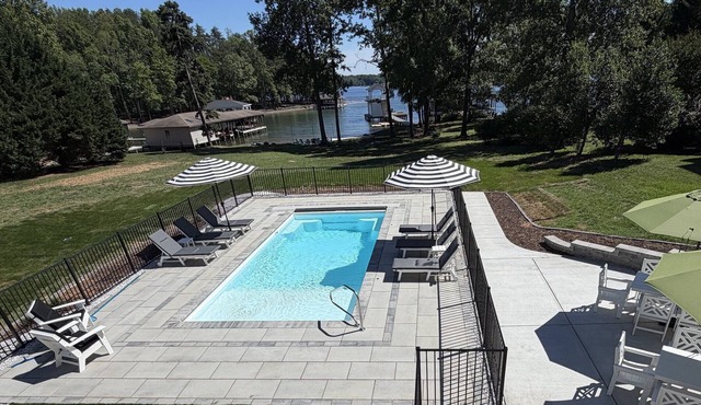NEW! Premier Lakefront Home - Private Pool/Hot Tub/Beach/Firepit/Games/Views!