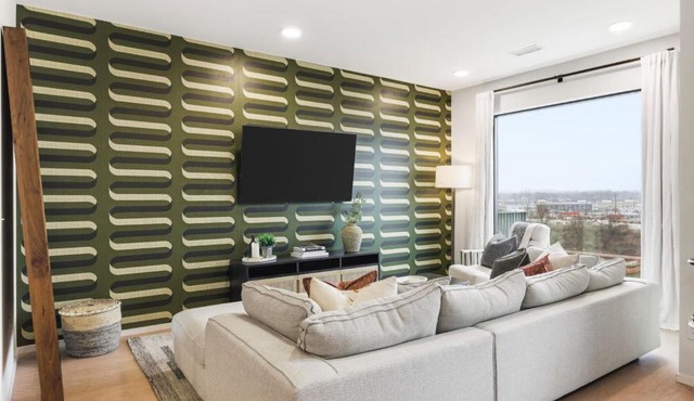 Penthouse River View Condo with Patio and Parking near Downtown