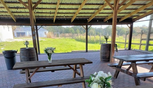 Quaint and Rustic Farm stay with screened in banquet barn.