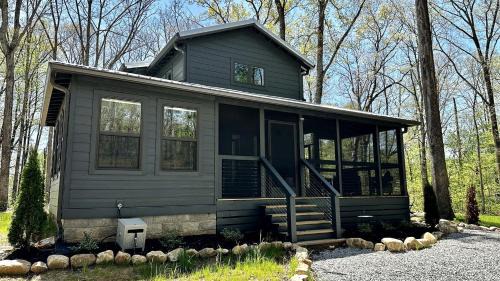 Relaxing Cabin Nestled Amidst Trees and Fire Pit Provided in Monteagle, Tennessee