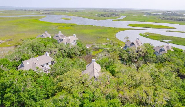 Serene Views Bald Head Island's stunning salt marsh is on display from this cozy three-bedroom