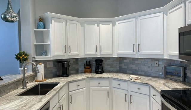 Spacious 3 BR, 2 bath condo in Gated Golf Community, private pool, near beaches.