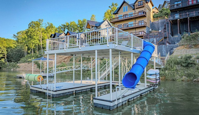 Stunning Mtn Lodge on Lake with two Story Dock, Indoor Pool, Arcade,and Hot Tub.