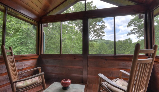 Unleash adventure at Four Ridges! This pet-friendly haven offers a hot tub, firepit, WiFi, and doorstep hiking for boundless exploration