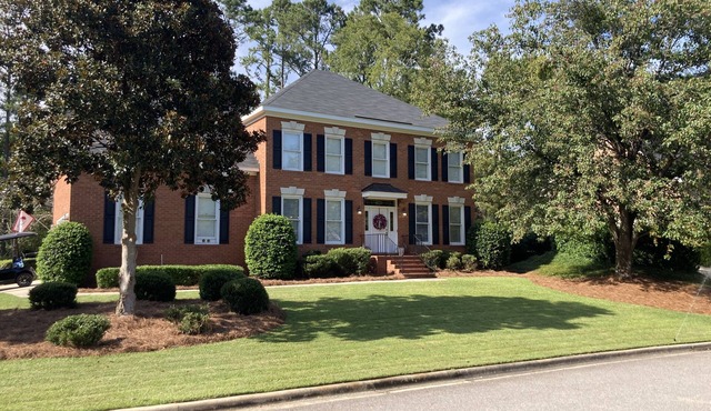 Updated and clean Masters rental in a gated, golf community