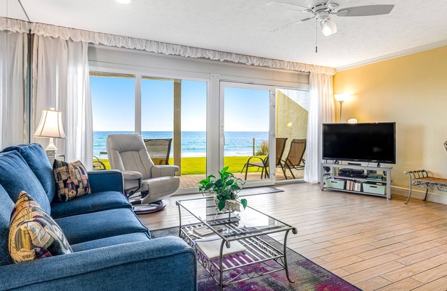 Stylish first-floor condo with water views & easy beach access