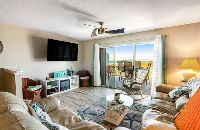 Stylish townhome with sound view, W/D, & HEATED community pool
