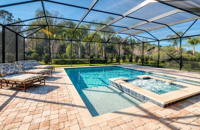 Traditional Home with Screened In Pool and Spa at Encore