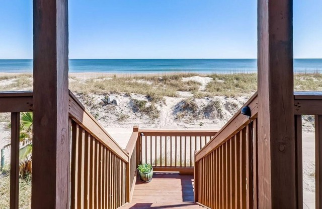 Updated Home with Covered Porch to Enjoy the Ocean Breezes and Sound of the Waves!