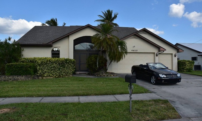 Lochmoor Waterway Estates House | Bring your boat to tie up to the new dock with easy access to the Caloosahatchee
