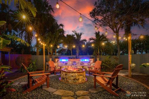 New Smyrna Beach House | Dog Friendly Home with Private Fenced Zen Yard & Fire Pit! STEPS to the Beach!