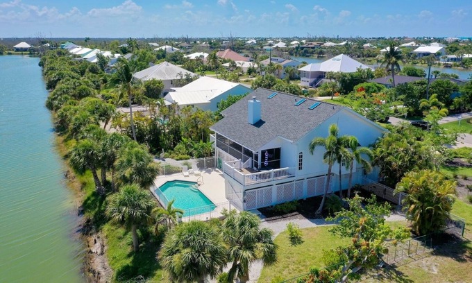 Murex Lakes House | Island time.walk to beach, heated pool, wide water views. Pet friendly!