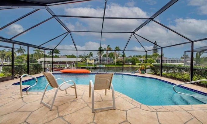 Caloosahatchee House | Seascape Retreat - Canal front Cape Coral Rental