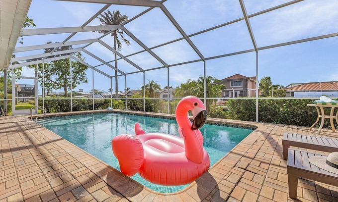 Pelican House | Spacious, Heated Pool Home w/Gulf Access- Villa Sunset Point - Roelens Vacations