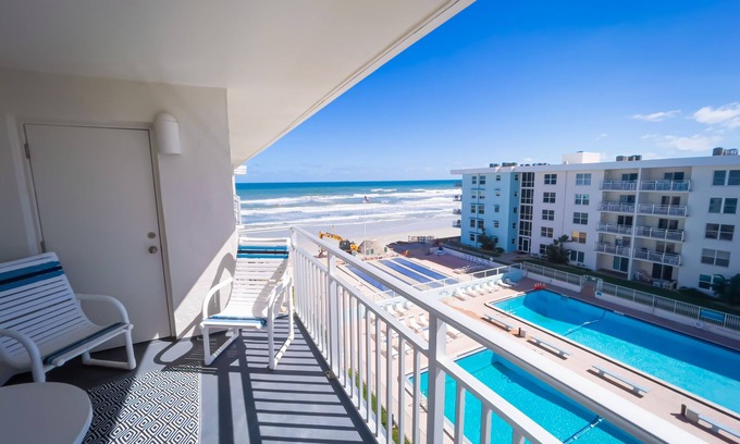 New Smyrna Beach Condo | Top-floor condo with ocean/pool views, private balcony, and heated beachfront pool