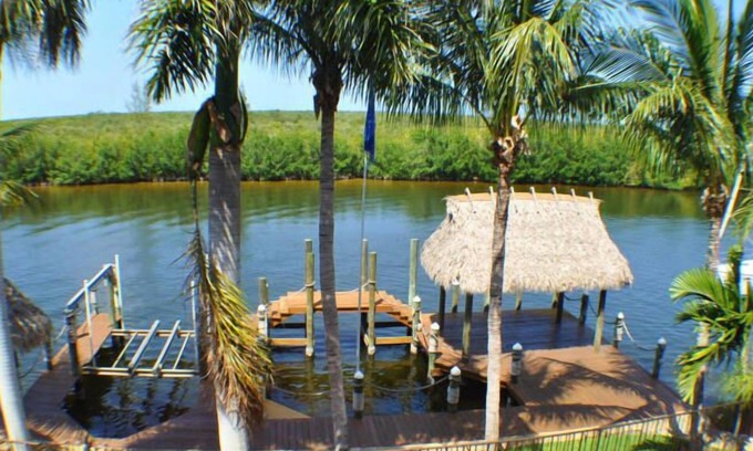 Peninsula Point House | Waterfront Exec Home with all amenities; Gulf Access; Large Dock with boat lift.