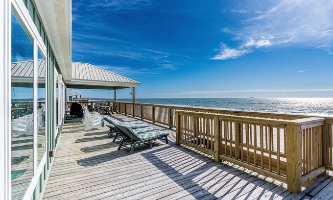 Dauphin Island House | Waterfront home with wraparound deck, BBQ, spacious interior, & W/D