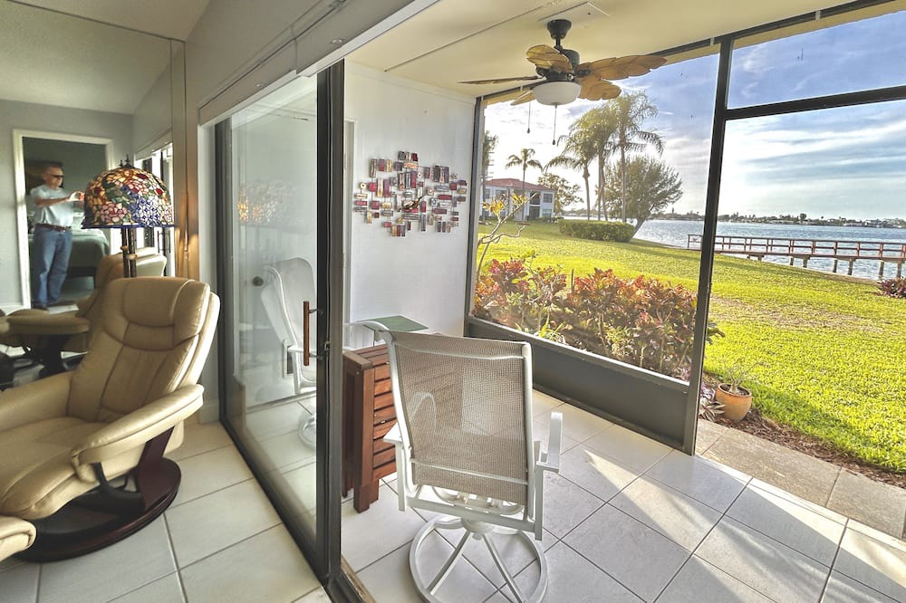 Casa del Mar Condo | Waterfront condo with bay view, pool, patio, & W/D - calendar month rental