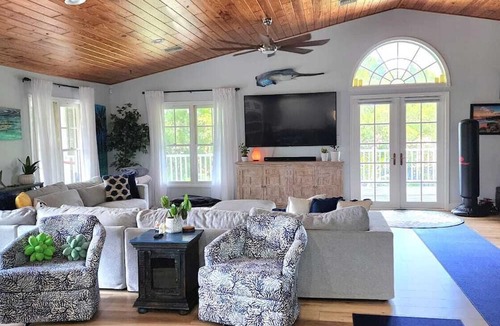 Palm City House | Key West Style - Two-Story Tiki Retreat
