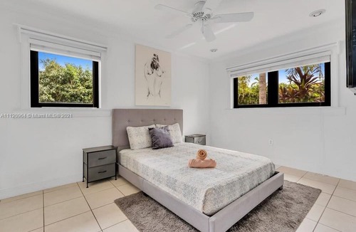 Ludlam House | 5BR Villa in South Miami w/ Pool, Bball Court + More