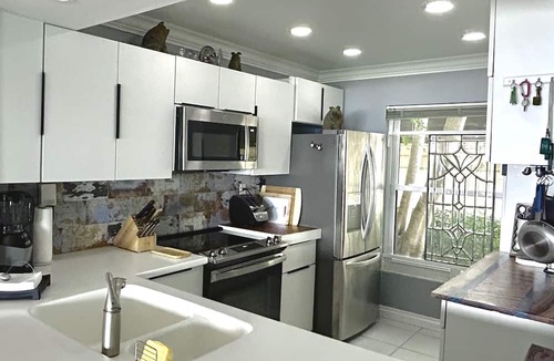 Casa del Mar Condo | Waterfront condo with bay view, pool, patio, & W/D - calendar month rental